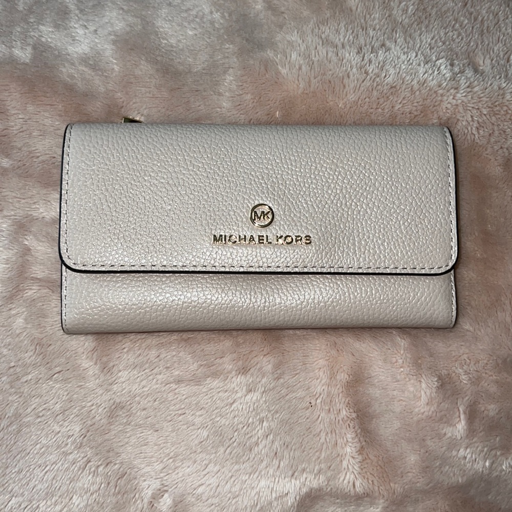 Michael Kors light pink trifold wallet